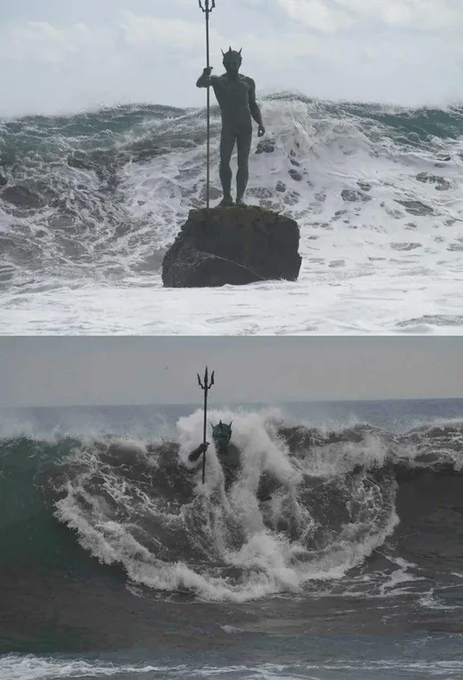 Rainmaker1973's tweet photo. The bronze sculpture of Neptune rising from the sea at Melenara Beach in Spain https://t.co/bRxXxe7HUB