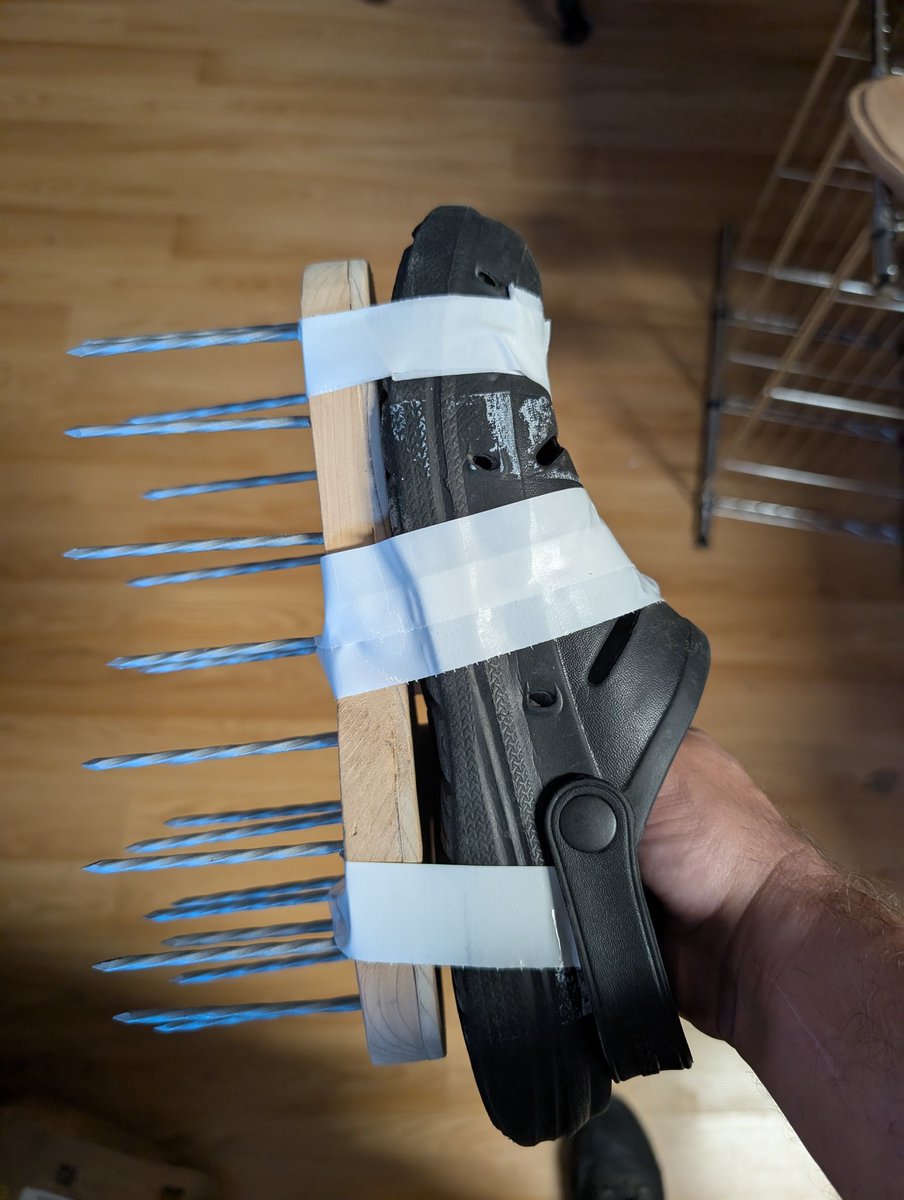 BBQBryan's tweet photo. I promise you this isn't even the most redneck thing I've done. Lawn aerators...1/4 inch plywood glued and screwed above the nail heads. https://t.co/H8XF4TDHMN