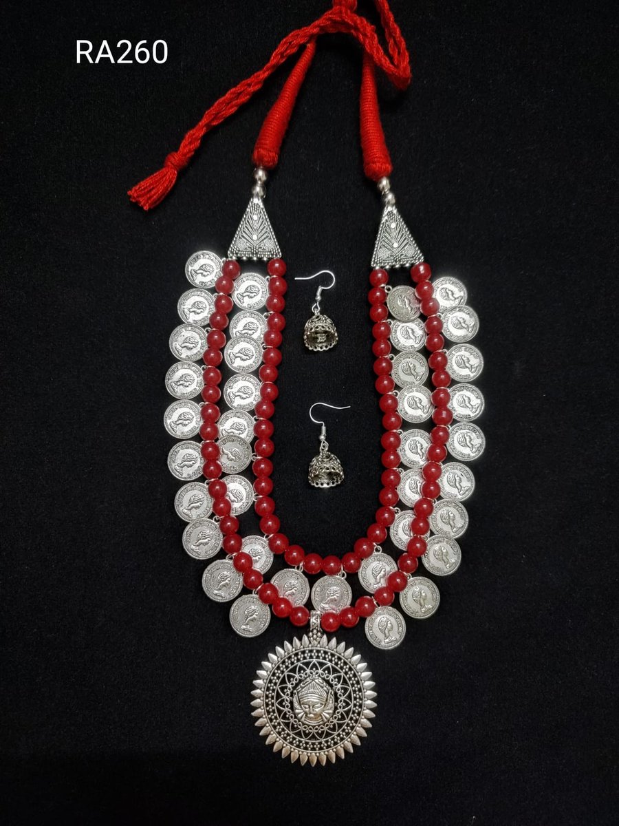 Zivvo82's tweet photo. More than a choker, it's a story of strength. The Regal Coin Choker has silver-toned coins and vibrant red beads, centered on a Goddess Lakshmi pendant. It honors heritage.

What piece of jewelry makes you feel powerful?

#style #giftideas https://t.co/La5DlJsMe3