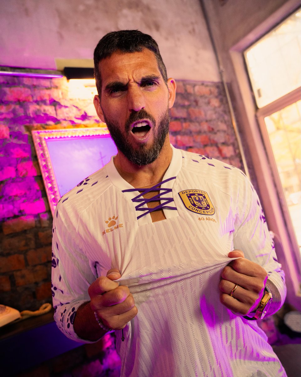 soccerjerseynws's tweet photo. 🇨🇱 Deportes Concepción unveiled their Winter 2026 kits x Kelme.

In their traditional lilac and white colors, the shirts feature a lace-up collar with a gold insert and nods to the club's 60th anniversary.

The Kelme paw logo runs down the sleeves.

What do you think of them? https://t.co/x06GqJHLpE