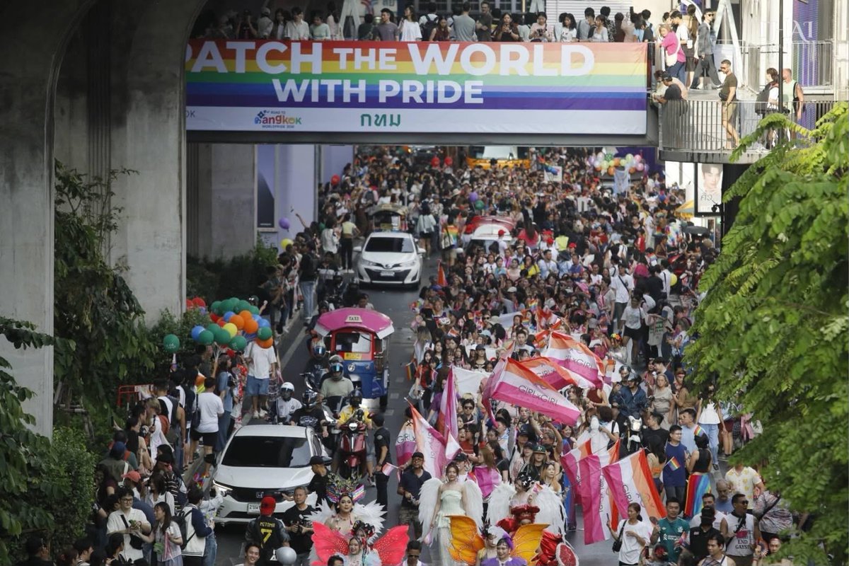 ThaiEnquirer's tweet photo. A giant rainbow flag stretching more than 300 metres took centre stage at the Bangkok Pride Parade 2026 on Sunday, as thousands of participants marched through the capital in a celebration of diversity and equality.

Held under the theme “Patch the World with Pride,” the parade highlighted LGBT+ rights and inclusion, with the massive flag serving as a symbol of unity and equal rights.

The 4.8-kilometre procession travelled from Nararom Intersection on Silom Road to the Thephasadin Stadium grounds, featuring six themed parade groups representing different communities and causes.

Organisers said the event aimed to promote gender equality and encourage pride in diversity across society.

#Thailand #Bangkok #BangkokPrideParade2026 #LGBT+