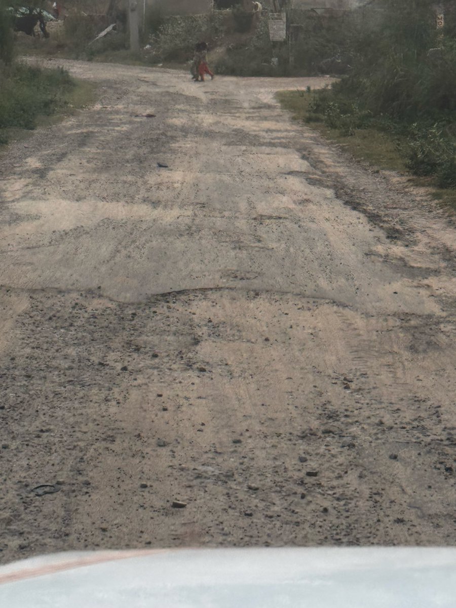 vijay_vijay123's tweet photo. The road from NH-8 to Nithara village in Shahpura constituency is in very poor condition and has been ignored for years,while nearby villages have received proper roads.we are facing daily problems.Kindly ensure equal development and immediate repair of this road.@ManishYadavIn https://t.co/xNY26rW0KT