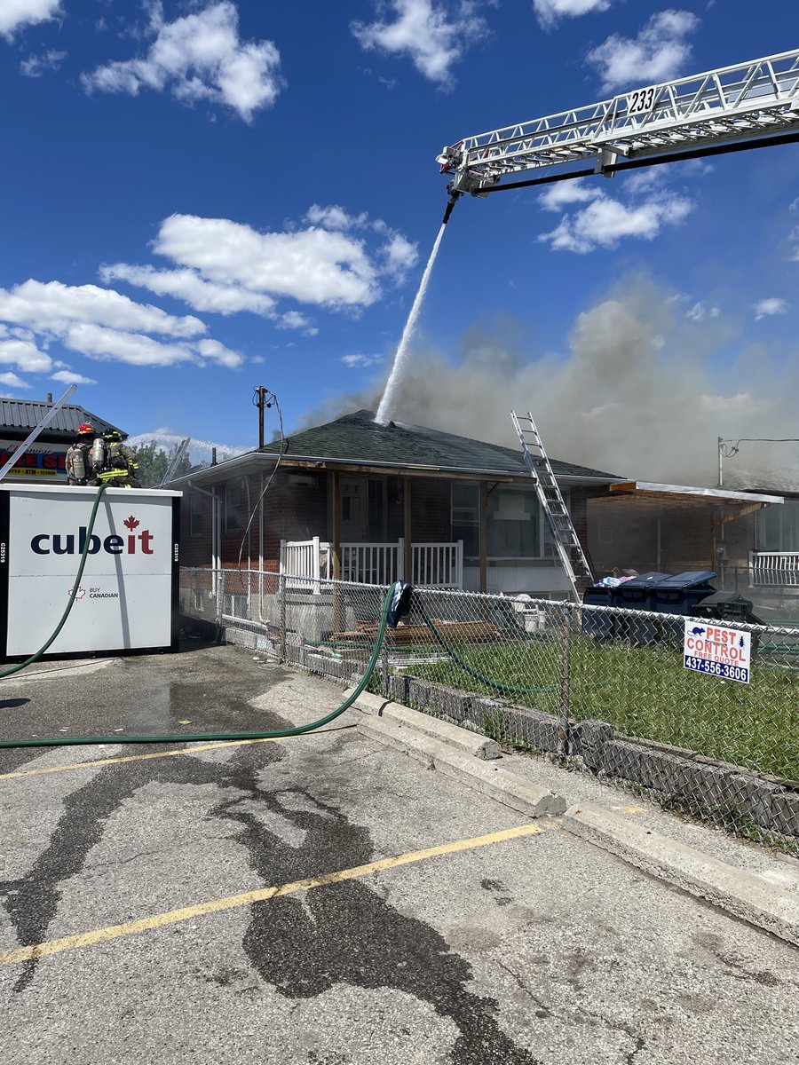 Toronto_Fire's tweet photo. TFS crews on scene at 2 alarm fire on Ellesmere Rd (at Pharmacy Ave). Heavy flame and smoke on arrival. Crews completed interior searches, have main body of the fire knocked down, and are continuing to fight fire in the roof.  #toronto ^dc https://t.co/EHL8sbtmEW