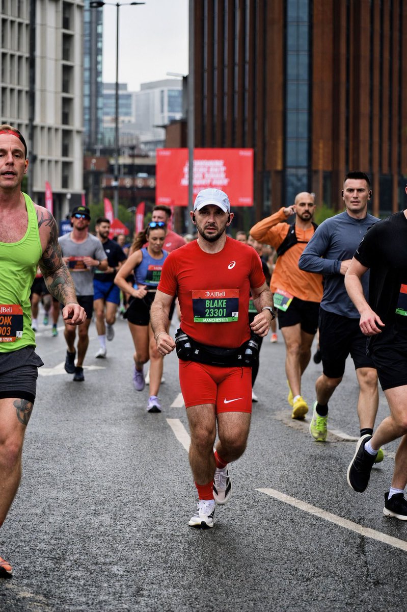 DuggTeebs's tweet photo. Action shot from Manchester Great Run earlier today. Put it through ChatGPT to clean it up and somehow it’s coloured in my beard like I’ve got one of them spray-on barbershop beards. Oh and changed my face when I didn’t ask it to 🤣 https://t.co/UwXzX7UeLO