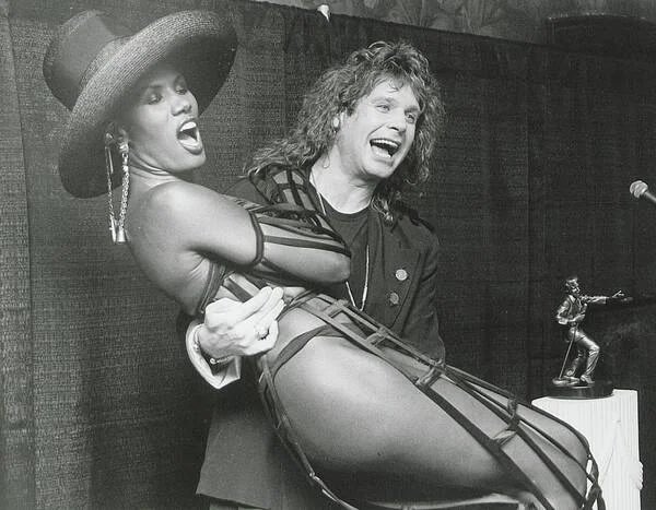 OzzyOsbourne's tweet photo. May 31, 1989 
The International Rock Awards at the Park Avenue Armory in New York, New York. Ozzy and @GraceJones presented the MVP Guitarist Award to @EricClapton during the event. https://t.co/bMkh22EMsH