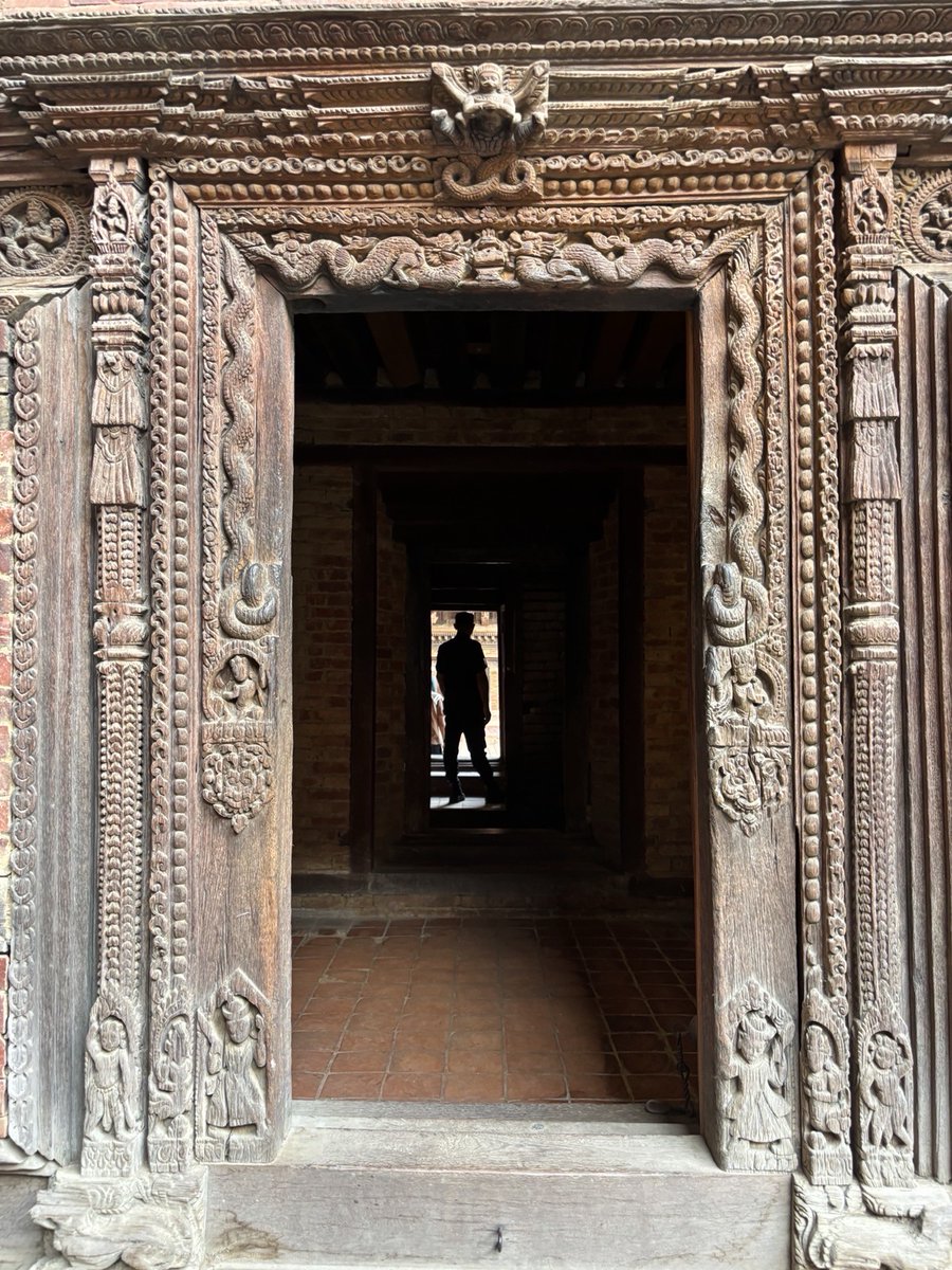 UnderSecPD's tweet photo. The U.S. Ambassadors Fund for Cultural Preservation (AFCP) is one of the coolest cultural things we do at State. For modest amounts, we help to excavate, preserve, and restore priceless historic buildings, archeological sites, religious archives, and other world heritage.

Today I toured Patan Durbar Square, a complex of 16-17C palace and temple structures damaged by a 2015 earthquake. AFCP stepped in to support repairs, which were led by the gracious and expert Dr. Rohit Ranjitkar. Lalitpur Mayor Chiri Babu Maharjan welcomed me and joined us on our tour.

Restorations on many of these buildings were marginal — the teak timber held up well over centuries of tectonic events. Where new carvings were needed, Dr. Ranjitkar tracked down descendants of the original artisans who chiseled the fixtures, providing them training where needed so they could contribute replacement pieces.