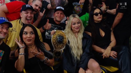 WrestleOps's tweet photo. Women’s World Champion Liv Morgan in the crowd for #WWEClash. https://t.co/vm4U2flnC6