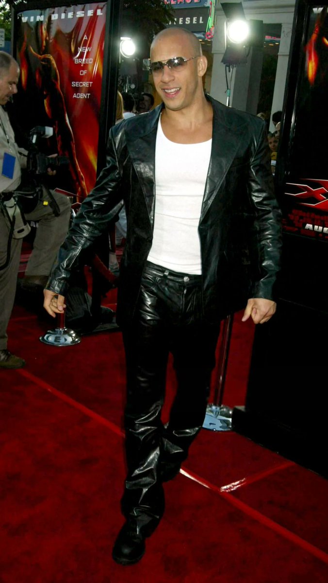 BufferedPast's tweet photo. At the world premiere of xXx in Los Angeles on August 5, 2002, guests bypassed formal evening wear for casual early-2000s trends, including custom graphic denim and sportswear. https://t.co/JJxzJnCVg5
