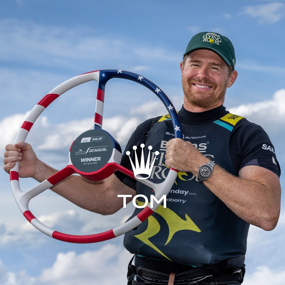 ROLEX's tweet photo. Congratulations Tom Slingsby and the @BondsFlyingRoos Team on a 1st win at the Mubadala New York Sail Grand Prix, marking a 3rd consecutive @SailGP victory. This crown is yours. #RolexFamily #Reachforthecrown https://t.co/mkicqYrJxI