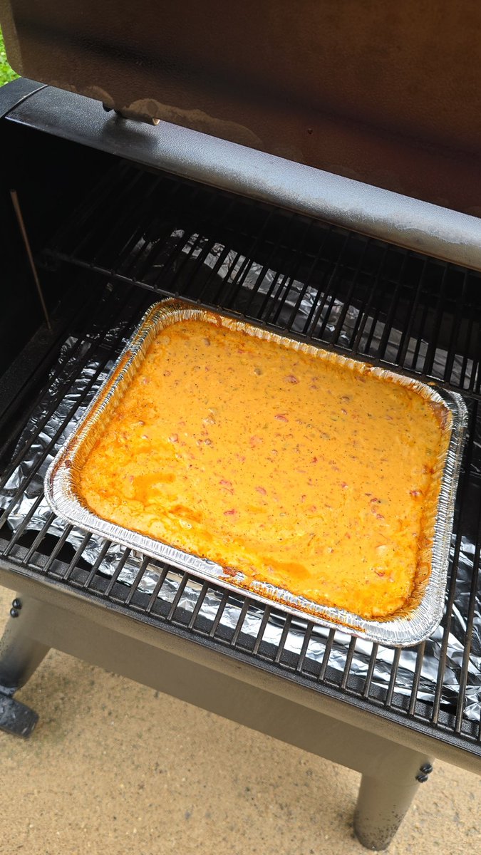 RedDirtCyclone's tweet photo. Smoked queso (with chorizo) for a staff potluck tomorrow. They'll be lucky if any makes its way there. https://t.co/CJ5qy10jBK