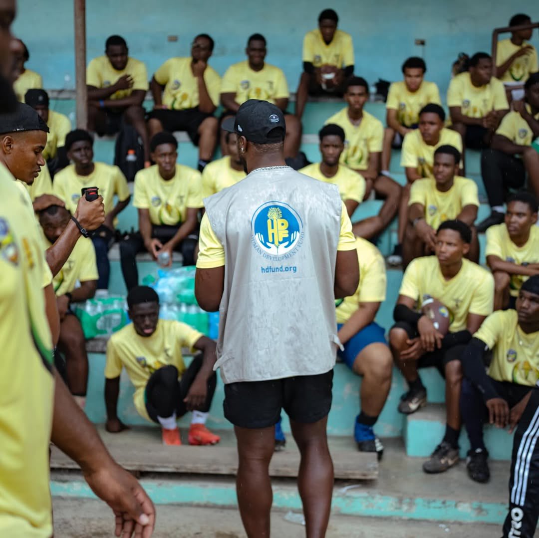 JacobBarzilla's tweet photo. Texans LB Azeez Al-Shaair in Jamaica with the HumanDevelopmentFund along with Bills WR Joshua Palmer: https://t.co/3mTGR2Inu5