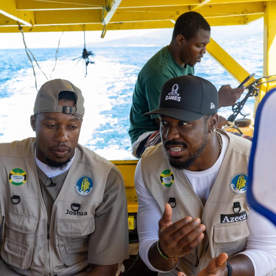 JacobBarzilla's tweet photo. Texans LB Azeez Al-Shaair in Jamaica with the HumanDevelopmentFund along with Bills WR Joshua Palmer: https://t.co/3mTGR2Inu5