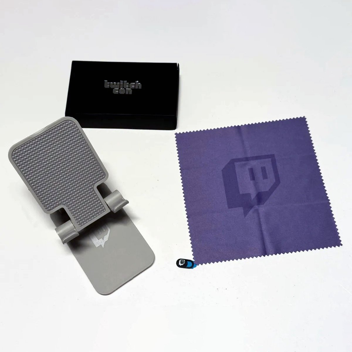 zachbussey's tweet photo. Twitchcon Rotterdam 2026 Affiliate Gift
- Branded Phone Stand
- Branded Cleaning Cloth https://t.co/e3bc1XLJ9F
