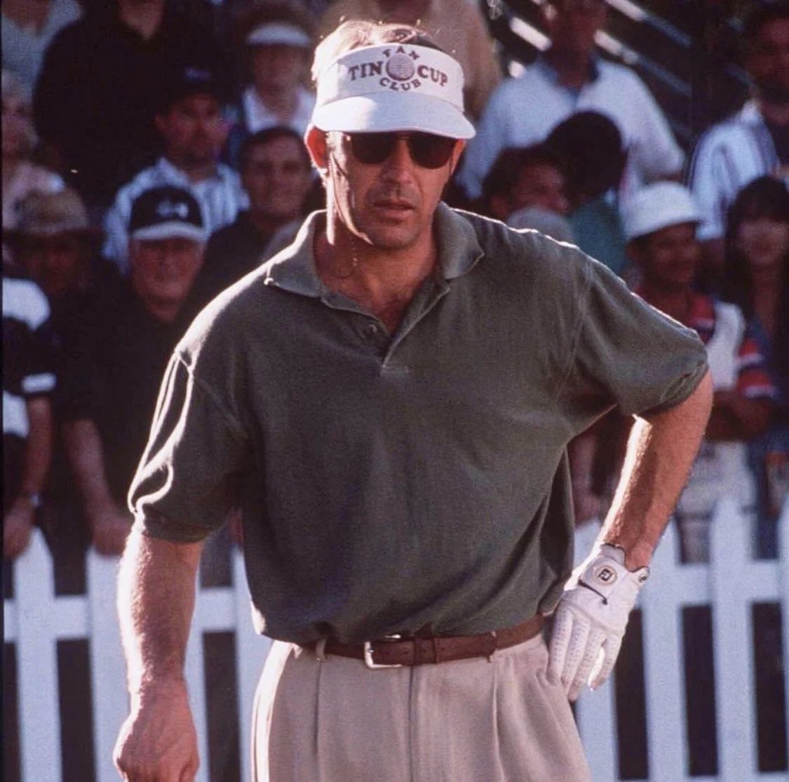 alecttrona's tweet photo. Kevin Costner golf style. Oversized polos tucked into pleated trousers, good leather belts, vests https://t.co/DzFQRjZMXb