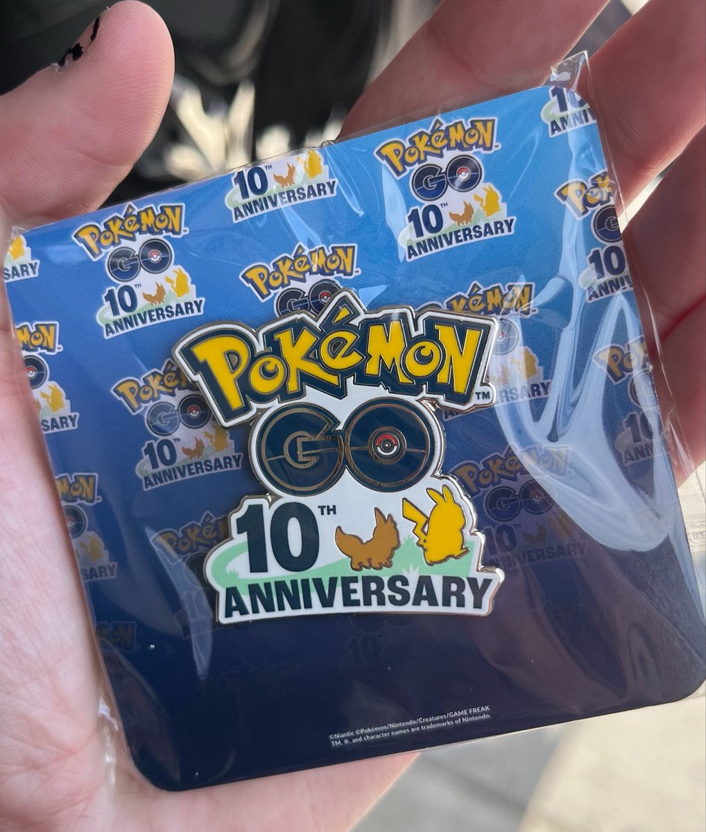 PhantomInk_'s tweet photo. We don’t worry about how much I spent at the pop up shop but anyways, I adored the photo ops scattered around the area:) 
#pokemongofest2026 
Crazy to think I’ve been playing for (almost) a full ten years now. https://t.co/EGdO3mTCLv
