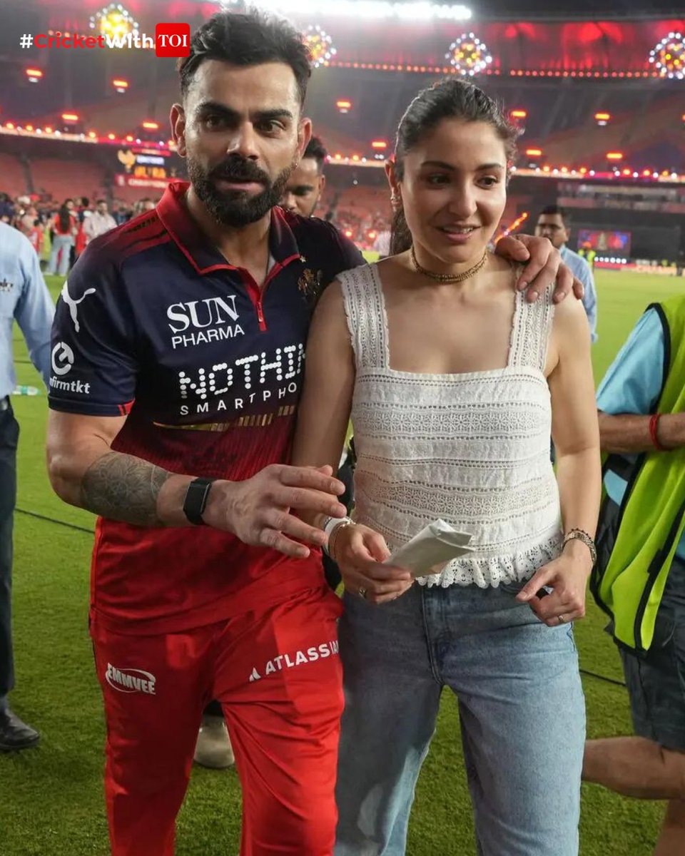 timesofindia's tweet photo. #InPics | He brought home the trophy. She brought the smile. ❤️🏆

After years of waiting, heartbreak and hope, Virat Kohli and Anushka Sharma shared a moment that RCB fans will cherish forever.

#ViratKohli #AnushkaSharma #RCB #IPL2026 #CricketWithTOI https://t.co/eXzDomVhbP