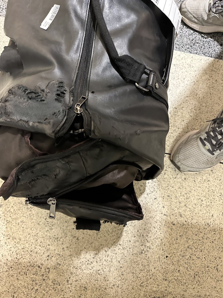 DustinSKlein's tweet photo. @FrontierCare  @FlyFrontier  how good is your customer service? My bag was destroyed by you today. https://t.co/s1TP3GzIx5