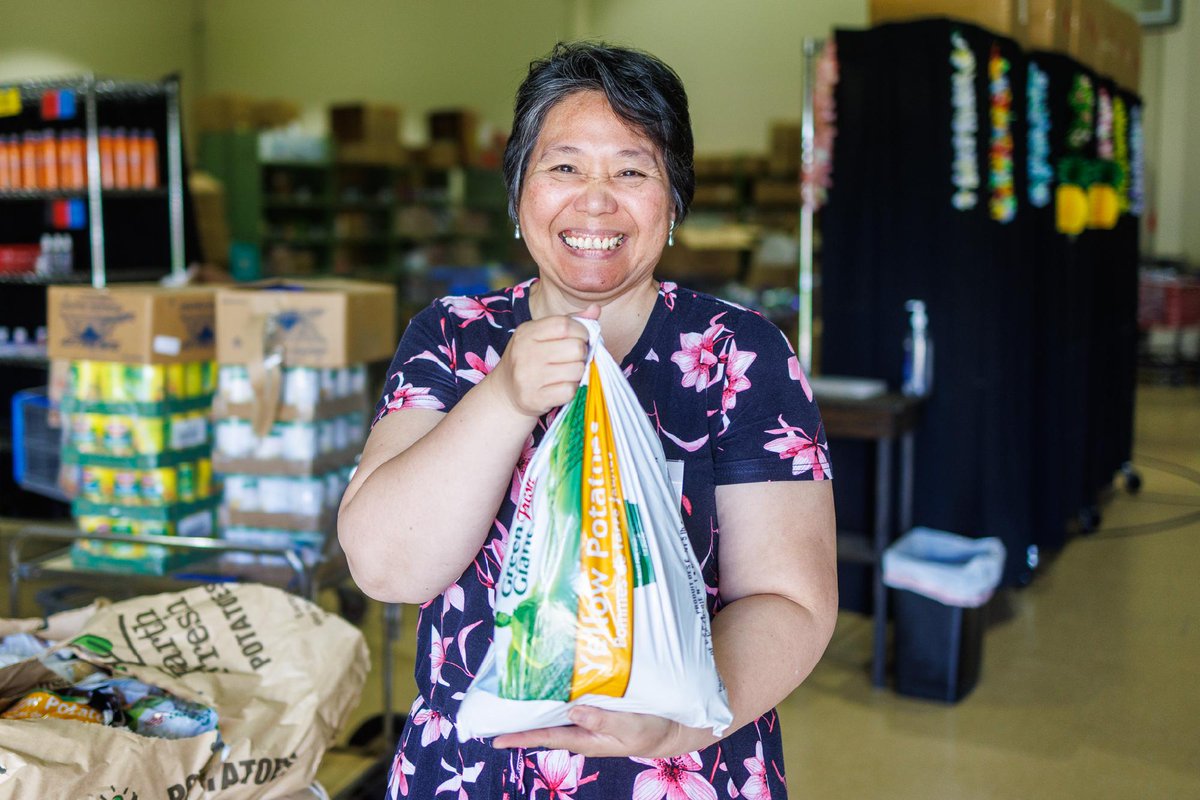 FeedingAmerica's tweet photo. "I'm very proud to be a small part of a bigger plan — that no one would go hungry." Vivian volunteers at a Houston food pantry and receives support there too. She shows up anyway. Every time. 🧡 #AAPIHeritageMonth | @HoustonFoodBank https://t.co/ldeFYZO8mb