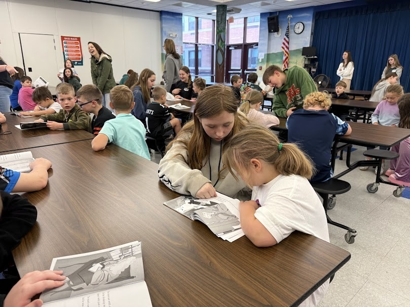 CorinthNY's tweet photo. Our 6th grade ELA students partnered with 1st graders as pen pals to build a love of reading and writing while serving as mentors! They recently visited CES to meet their pen pals and read together.  Great job, Riverhawks! #ReadersasLeaders #RiverhawksRising https://t.co/a0ymqsQOT1