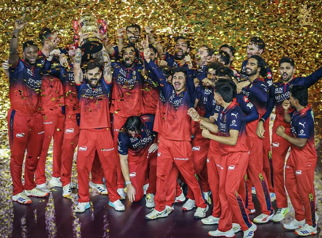 heresidharth18's tweet photo. Pressure is a privilege ❤️
From "Maybe next year" to "This is our year " Champion RCB is dominating this season!
back-to-back trophy 🏆
special mention to king @imVkohli for a fabulous knock &amp; oh! our captain @rrjjt_01 
Dream day for us #RCBwins 😭💪 https://t.co/0q0M0St3QW