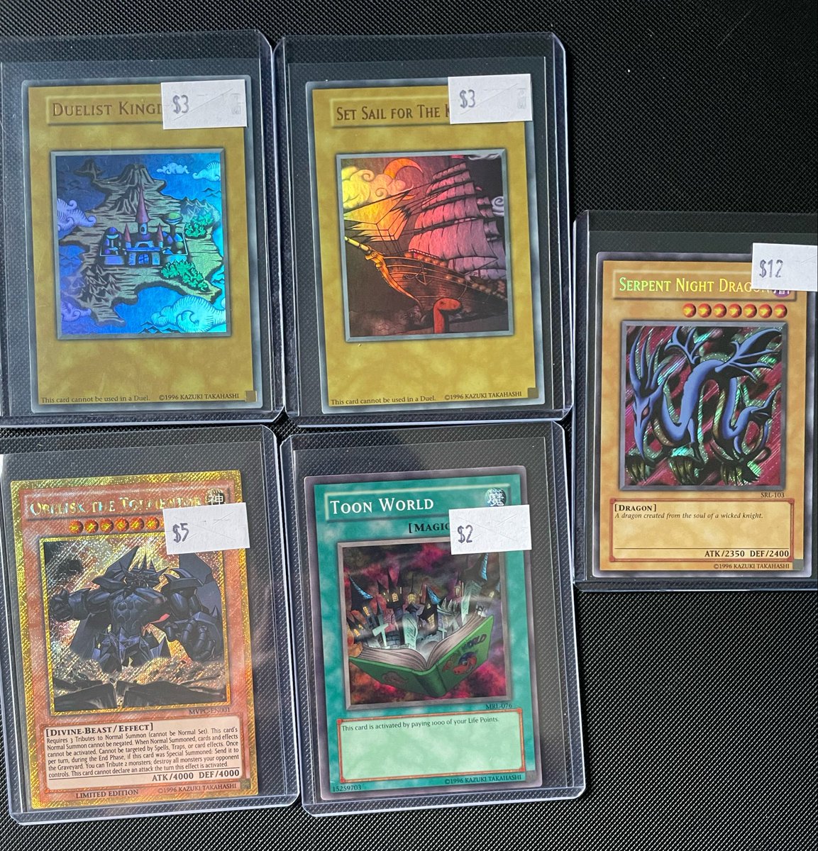 Chestfullcards's tweet photo. My carshop finally has a Yu-Gi-Oh! dollar  box bin.
Always nice to pick up some throwback secret rares https://t.co/nLug8VR6qg
