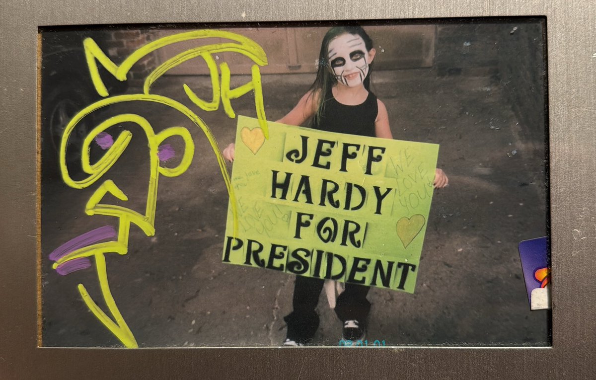 MatchaBabe_00's tweet photo. Life has a funny way of coming full circle. Years ago, I was the little girl in this photo at the one WWE show that came to my area, cheering for Jeff Hardy. Today, I got to meet him and have him sign that same picture. My younger self would never believe it. https://t.co/bWaRmVtPKi