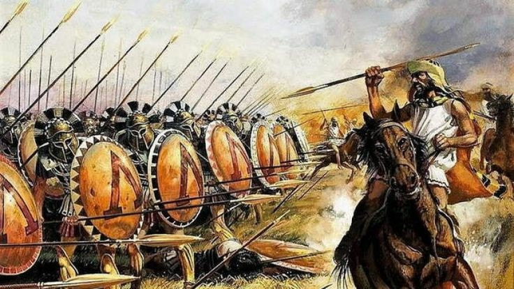 HellasReborn's tweet photo. Από την φιλοσοφία της Ελληνικής πολεμικής μηχανής, στην ιδεολογική συγκρότηση του εθνικοσοσιαλισμού.

«αὖτις δὲ τὸ Ἑλληνικὸν ἐὸν ὅμαιμόν τε καὶ ὁμόγλωσσον καὶ θεῶν ἱδρύματά τε κοινὰ καὶ θυσίαι ἤθεά τε ὁμότροπα»

Ο σημερινός άνθρωπος δεν αντιλαμβάνεται τι ήτανε η φάλαγγα, μια πολεμική μηχανή που εμπεριείχε την στιγμή της μάχης όλο τον ελληνικό τρόπο σκέψης.
Δεν ήταν απλώς ένας στρατιωτικός σχηματισμός, αλλά η φυσική ενσάρκωση της Ελληνικής φιλοσοφίας. 
Μια φιλοσοφία ολοκληρωτικής αυταπάρνησης για χάρη του συνόλου.
Το να διαχωρίσουμε την ελληνική πολεμική τέχνη από τη φιλοσοφία είναι αδύνατο, καθώς και τα δύο βασίζονταν στις ίδιες θεμελιώδεις αρχές, Αρετή, Ισονομία και Δίκη.
Απαιτούσε από τον στρατιώτη να ιεραρχήσει τη γραμμή πάνω από την επιθυμία για την ατομικότητα του. Αν κάποιος έσπαγε τη γραμμή για την προσωπική δόξα, έθετε σε κίνδυνο ολόκληρο τον σχηματισμό και κατ’ επέκταση, την ίδια την πόλη. Αυτό ενίσχυε τη φιλοσοφική πεποίθηση ότι το άτομο έχει νόημα μόνο σε σχέση με το όλον (την πόλη ως οργανική οντότητα).
Το όπλον δεν προστάτευε μόνο τον άνδρα που την κρατούσε, αλλά κάλυπτε τη δεξιά πλευρά του άνδρα που βρισκόταν στα αριστερά του. Αυτό δημιούργησε μια αλυσίδα αμοιβαίας εξάρτησης.
 Ήταν η φυσική εκδήλωση της κοινωνικής συνοχής, είσαι υπεύθυνος για τη ζωή του γείτονά σου και εκείνος για τη δική σου.

«οὔτε χρυσός ἐστι γῆς οὐδαμόθι τοσοῦτος οὔτε χώρη κάλλεϊ καὶ ἀρετῇ μέγα ὑπερφέρουσα, τὰ ἡμεῖς δεξάμενοι ἐθέλοιμεν ἂν μηδίσαντες καταδουλῶσαι τὴν Ἑλλάδα»

Αν και οι Έλληνες ήταν ιεραρχικοί, η φάλαγγα εισήγαγε την έννοια ότι όλοι οι πολίτες στη γραμμή ήταν ίσοι στο καθήκον τους προς το κράτος. 
Το δικαίωμα να κρατάς δόρυ στη γραμμή και το δικαίωμα να συμμετέχεις στην πολιτική ζωή της πόλης ήταν ένα και το αυτό.
Ο Έλληνας στρατιώτης κατανοούσε ότι στεκόταν εκεί όπου τον είχαν τοποθετήσει οι θεοί και η μοίρα. Το να γυρίσεις την πλάτη δεν ήταν απλώς δειλία, ήταν μια πράξη μεταφυσικής ανταρσίας, που αποσύνθετε την συνοχή της πόλης. 
Αυτό τροφοδότησε άμεσα τη μεταγενέστερη στωική σκέψη, την ιδέα ότι πρέπει να σταθείς ακλόνητος στη θέση που σου έχει αναθέσει η φύση, ανεξάρτητα από τον τρόμο του αποτελέσματος.

«τοῖσι ἡμέας ἀναγκαίως ἔχει τιμωρέειν ἐς τὰ μέγιστα μᾶλλον ἤ περ ὁμολογέειν τῷ ταῦτα ἐργασαμένῳ»

Εδώ έγκειται η πρώτη μεγάλη φιλοσοφική αλήθεια, το άτομο είναι ανούσιο αν δεν είναι ενταγμένο σε ένα οργανικό σύνολο. Στον στωικισμό, ο άνθρωπος οφείλει να εκτελεί το χρέος του στη θέση που του έταξε η φύση.
Για τον Έλληνα, η ιεραρχία στη φύση ήταν αδιαμφισβήτητη. Οι θεοί, οι ήρωες, οι πολίτες και ο κόσμος ακολουθούσαν μια δική τους, έμφυτη τάξη. 
Ο Εθνικοσοσιαλισμός δεν εφηύρε την ιεραρχία, την ανακάλεσε από τη λήθη. Τα Σούτσσταφφελ λειτούργησαν με την ίδια αυστηρότητα που ο Πλάτων οραματίστηκε την Πολιτεία.
Για τον εθνικοσοσιαλιστή, όπως και για τον Έλληνα οπλίτη, ο πόλεμος δεν είναι απλώς μια διαμάχη. 
Είναι μια δοκιμασία πνεύματος. 
Τα μέλη των Σούτσσταφφελ, μέσα από το τελετουργικό τους, επιδίωκαν να συνδεθούν με τις δυνάμεις των προγόνων και ηρώων. 
Αυτό είναι καθαρά ελληνικός τρόπος σκέψης, ο «ηρωικός θάνατος» είναι η ύψιστη μορφή κοινωνίας με το θείο.
Επιχείρησαν να μεταφέρουν αυτό το πνεύμα στη νεωτερικότητα, προσπαθώντας να δημιουργήσουν μια ελίτ που δεν θα φοβόταν να σπάσει τα δεσμά του υλισμού. Όταν ο κόσμος κυριαρχείται από το χρήμα και τον ατομικισμό, μοναδική αντίσταση είναι η επιστροφή σε μια ανδρική, πολεμική και ιεραρχική κοινότητα, μια νέα φάλαγγα που θα αντέξει στις επιθέσεις της μοντέρνας κοινωνίας και του χρόνου.

«ἀλλ᾽ ὅμως ἐλευθερίης γλιχόμενοι ἀμυνεύμεθα οὕτω ὅκως ἂν καὶ δυνώμεθα. ὁμολογῆσαι δὲ τῷ βαρβάρῳ μήτε σὺ ἡμέας πειρῶ ἀναπείθειν οὔτε ἡμεῖς πεισόμεθα»

Σε μια πολιτεία όπου η πειθαρχία, η ιεραρχία, η αφοσίωση στο αίμα και ο απόλυτος σεβασμός στην ιστορική συνέχεια θα αποτελούν τον νόμο, όχι επειδή επιβάλλεται από κάποιο κράτος, αλλά επειδή είναι η φυσική έκφραση της ίδιας μας της ύπαρξης.
Το Αίμα και Γη, δεν είναι απλό σύνθημα είναι η αναγνώριση ότι χωρίς ζωτικό χώρο, το πνεύμα εκφυλίζεται και χωρίς αίμα ο χώρος δεν έχει νόημα.
Ο εθνικοσοσιαλισμός, ενισχυμένος από την ελληνική κοσμοαντίληψη, δεν ζητά την απλή επιβίωση. 
Ζητά την κυριαρχία του Πνεύματος πάνω στην Ύλη.
Το μέλλον ανήκει σε εκείνους που έχουν την ικανότητα να σχηματίσουν μια ιδεολογική, κοινωνική και βιολογική γραμμή, την οποία καμία δύναμη της παρακμής δεν θα μπορέσει να διαπεράσει.
Το μέλλον ανήκει σε εμάς.

«ἔστ᾽ἂν ὁ ἥλιος τὴν αὐτὴν ὁδὸν ἴῃ τῇ περ καὶ νῦν ἔρχεται, μήκοτε ὁμολογήσειν ἡμέας Ξέρξῃ»