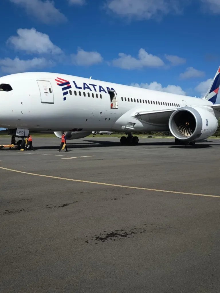 aviationbrk's tweet photo. NEW: LATAM Boeing 787-8 Dreamliner grounded at one of the most remote airports in the world after the L2 door was torn off by an airstairs truck.

The incident occurred on Friday at Mataveri International Airport on Easter Island in Chile, located approximately 3,759 kilometres slightly northwest of Santiago.

Photos: Alvaro Romero