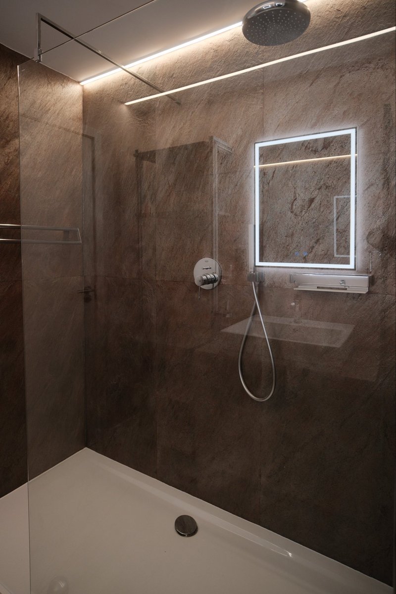 Wunderhausltd's tweet photo. At Wunderhaus, we believe exceptional design is found in the details.

Our bathroom shower enclosures are lined with large-format natural stone panels, showcasing revolutionary German stone veneer technology. https://t.co/ZTGIJuAQQx