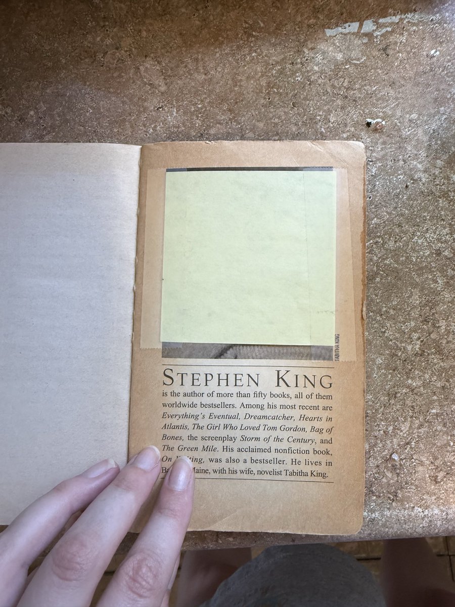 freakyraquel's tweet photo. I’d never looked at the back of this copy I’m donating to the library, and there’s a post-it over the @StephenKing headshot! Taped down securely by the previous owner. Image reveal below https://t.co/F2qMXXeN1o