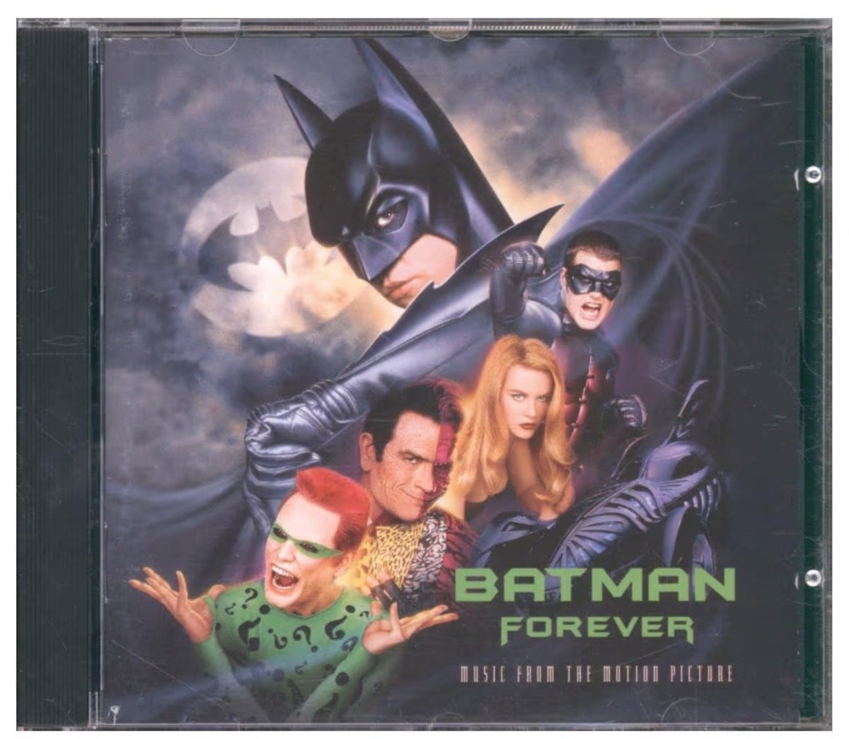 DailyBatForever's tweet photo. On this day 31 years ago, the great original soundtrack of
#BatmanForever 
was released.

Cover and CD disc of the album that sold over 2 million copies in the US alone achieving 2×Platinum, over 4 million copies around the world. https://t.co/7H75W0mqJj
