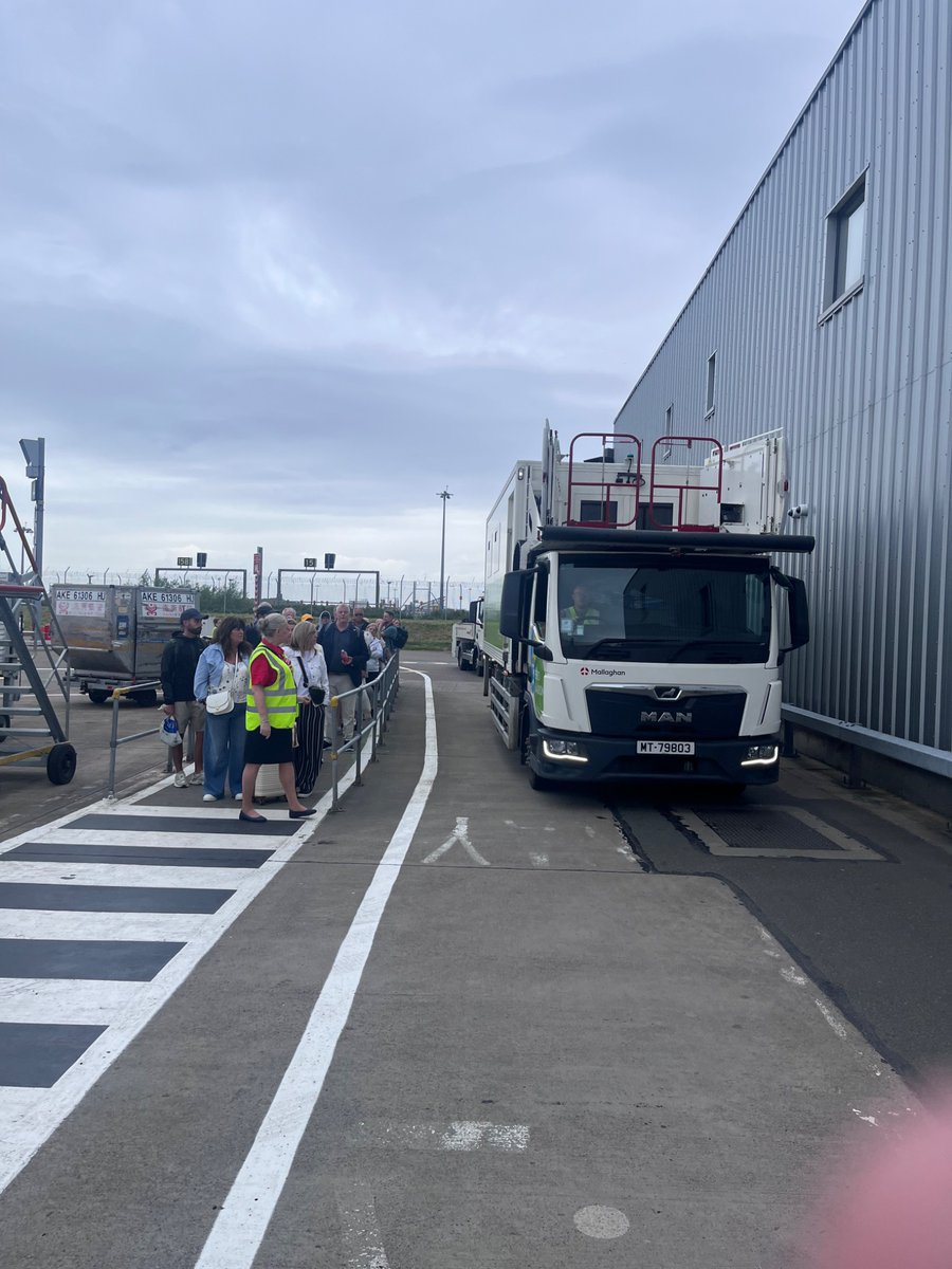 MeHopey's tweet photo. @EDI_Airport @jet2tweets 

Complete shambles after getting off a jet2 flight last evening. Lorries and buses fighting to get through passengers queued outside waiting to get through security. A big Health and safety issue! https://t.co/DpqZeCS11B