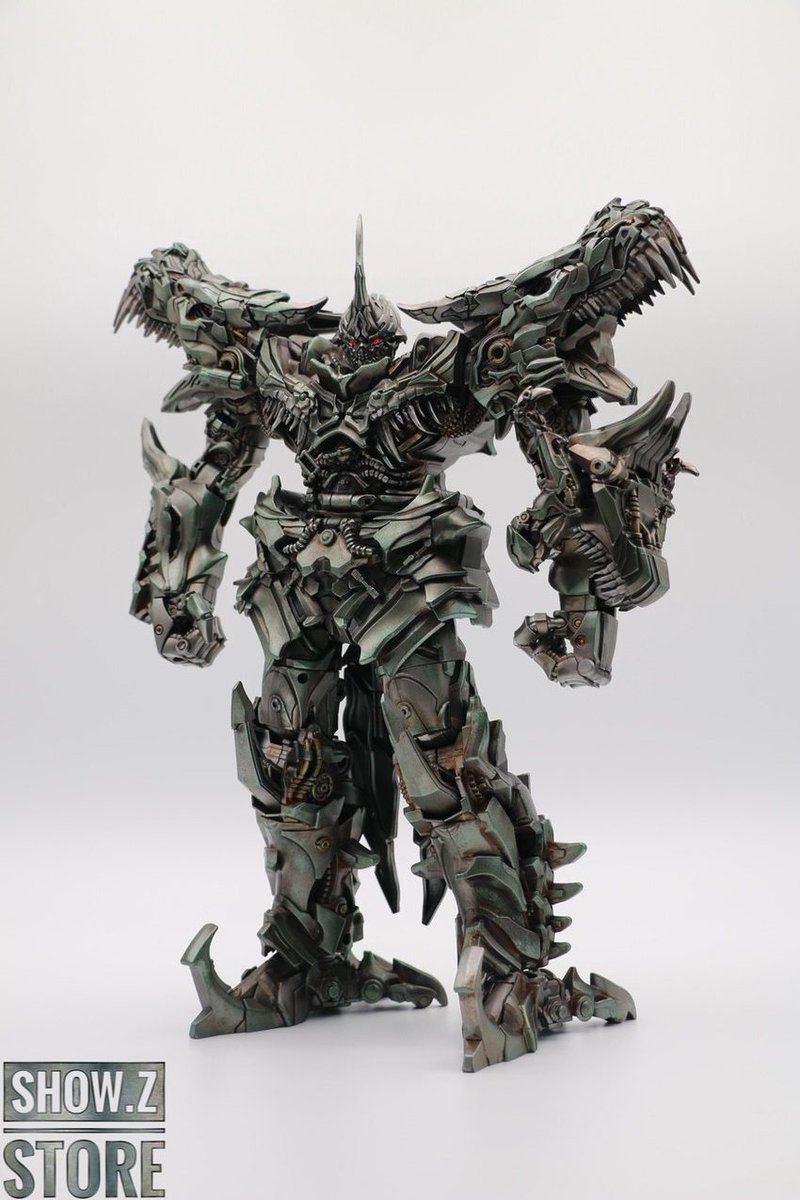 Primidian's tweet photo. @TFHypeGuy Why waste money on this when there are plenty of SS Grimlock upscales that cost less than $100 and look way better. They are 14-15 inches tall. https://t.co/uCfMgJ8lUZ