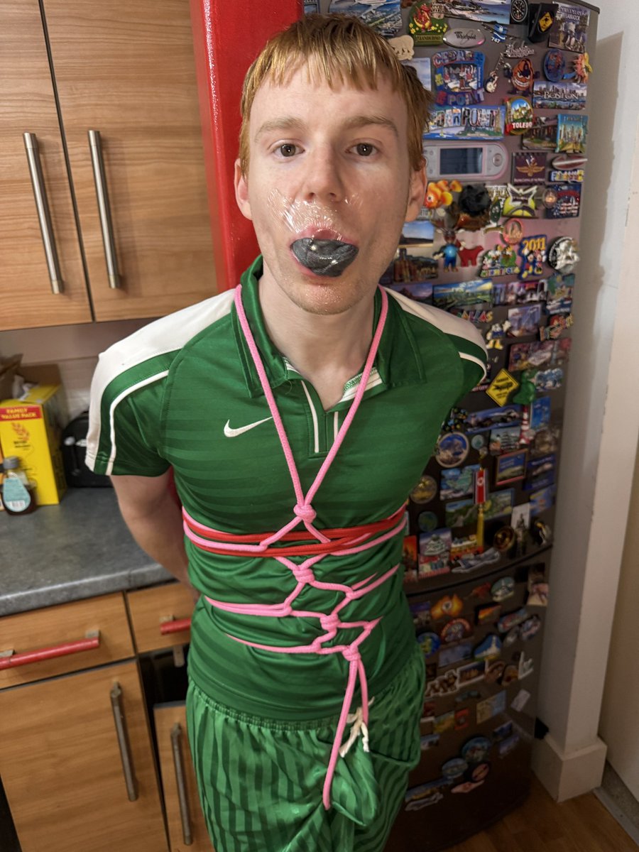 BondageNW's tweet photo. So the footballer I kidnapped changed teams at half time &amp; went from a yellow footy kit to a green kit. He got really mouthy while tied to my steel kitchen girder so I stuffed a sock in his mouth &amp; kept it in there by using Tegaderm film! Who wants to see the whole gaging video? https://t.co/AZOItlW4OP