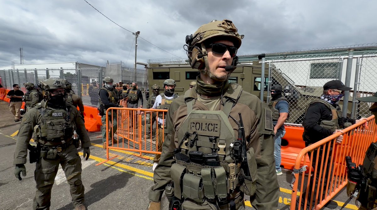 sandibachom's tweet photo. 🚨🚨🚨🚨At Delaney Hall privately run prison for profit yesterday. 

You’re gonna have to explain to me like I’m five, why they have to dress like this to protect people seeking asylum with no criminal records, who are made to eat food with maggots on them and are denied medical attention. 

Are you keeping somebody in or are you keeping somebody out? Neither. 

Last night, the New Jersey state police brutalized my friends they broke bones. They teargassed they pepper sprayed. They shot less lethal bullets.  

This is not about the ice detention facility. This is about getting used to a police state.