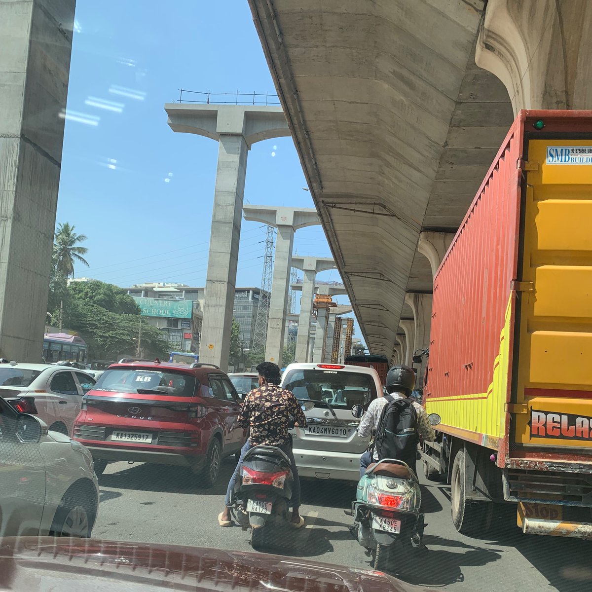 sunihani's tweet photo. @hebbaltrafficps 
Time :10:05am 
Date :01.06.2026 
Place :Kodigehalli gate signal 
No helmet ,using mobile. https://t.co/VnbFqNGDMT