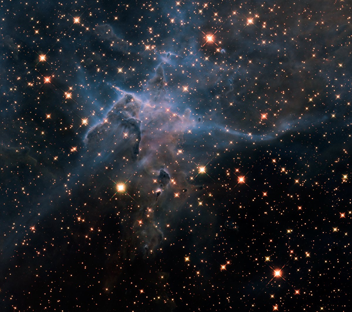 universal_sci's tweet photo. In this near-infrared view from the Hubble Space Telescope, a colossal gas-and-dust pillar—stretching three light-years—gradually dissolves under the powerful radiation of surrounding stars.

(Credit: NASA, ESA, Mario Livio, Hubble 20th Anniversary Team - STScI) https://t.co/jxXwIrmEga