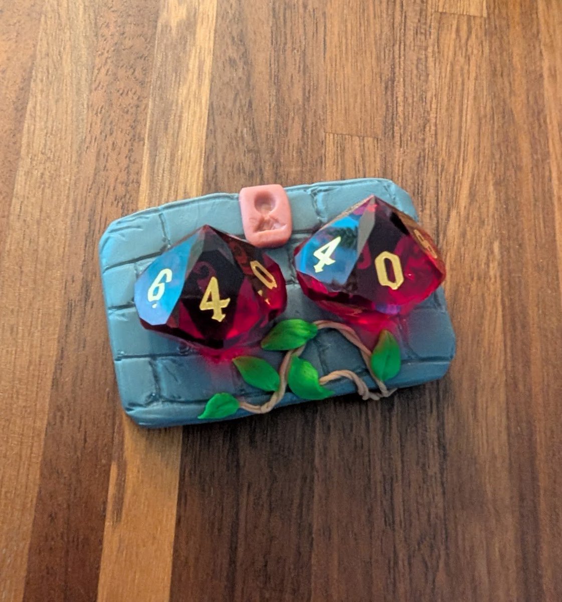 nestapendragon's tweet photo. We did a fun day of crafting with friends and their kids today. We all made stuff with Fimo and Sculpey!

I - only having one hobby (MTG) - made this dice holder/life tracker and I really love how it turned out 🥰

It holds my dice perfectly 🏰 https://t.co/7H38Ja8UAm