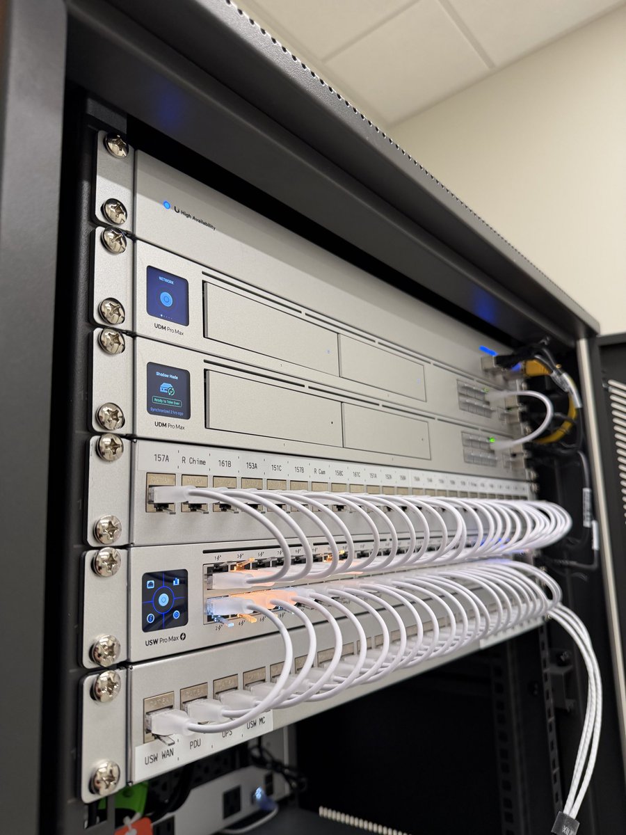 AdiumTech's tweet photo. This rack came together nicely and it swings open for easy access in the back. Just wish it came in silver!

Full console redundancy using the WAN switch and two UDM Pro Max’s in shadow mode. https://t.co/2bs5bA8SZR