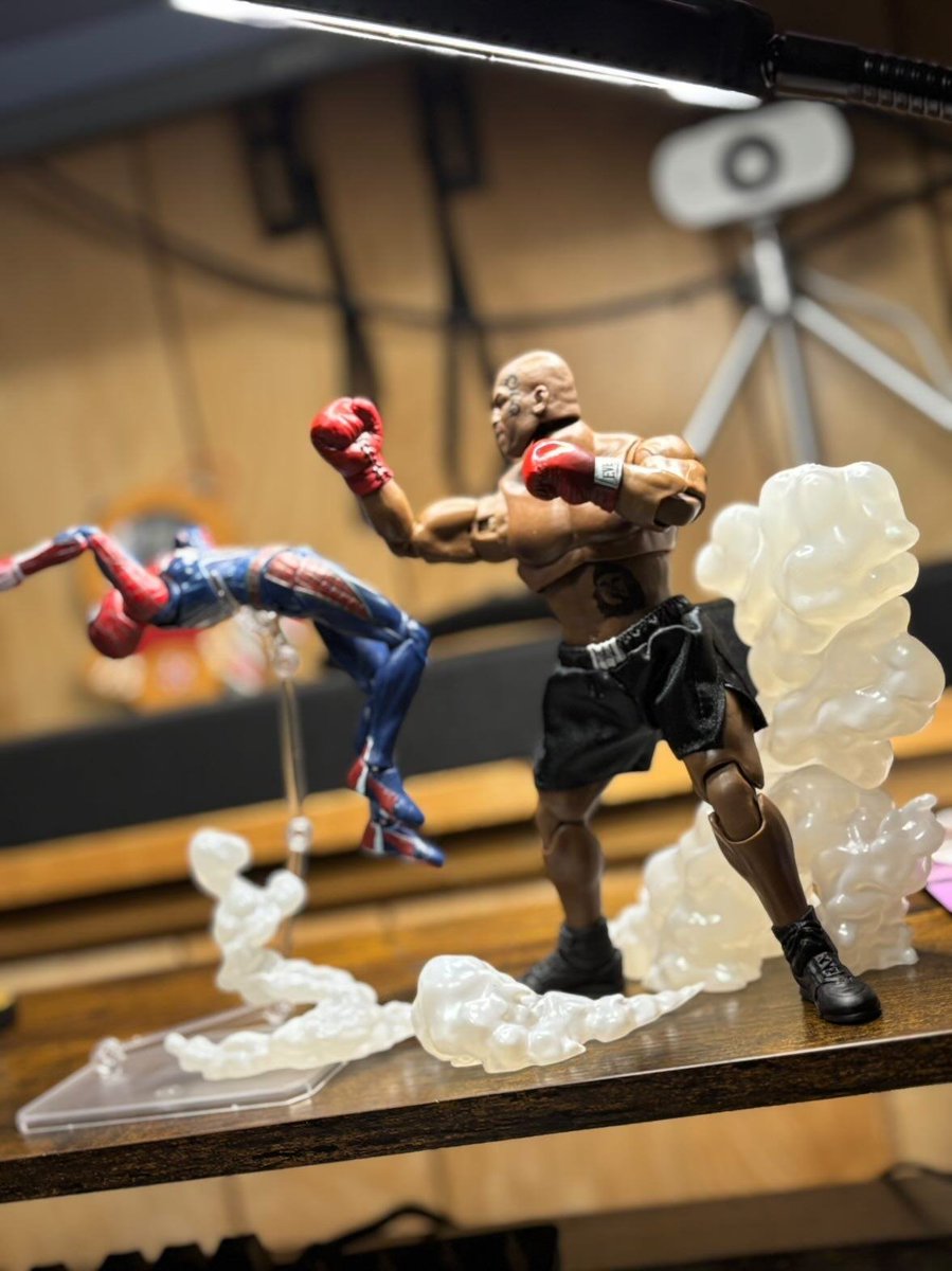 RewindMike's tweet photo. Here are some recent shots I took of my Mike Tyson action figure. He's a ton of fun to pose a place in fun situations. https://t.co/XfJwKiwM8s