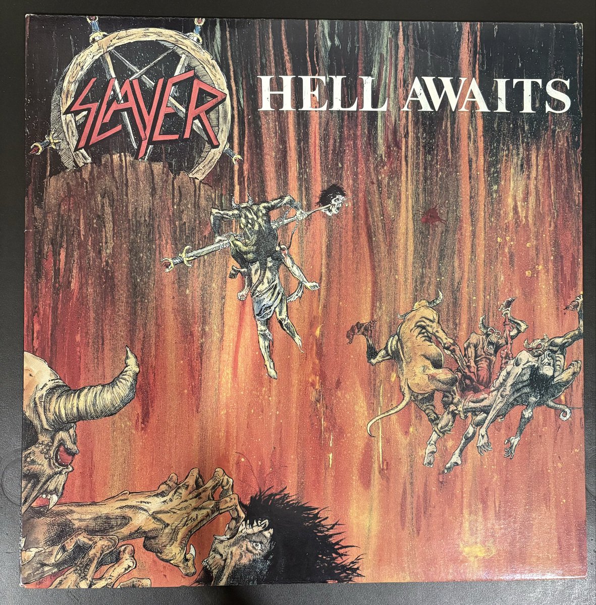 SIGARTYR's tweet photo. Great used record find recently, as I’ve never run into original Slayers out in the wild, but here’s the original Canadian release of Slayer - Hell Awaits on Banzai records 1985. Sounds amazing, what a fun record. https://t.co/lbTiGMXlTc