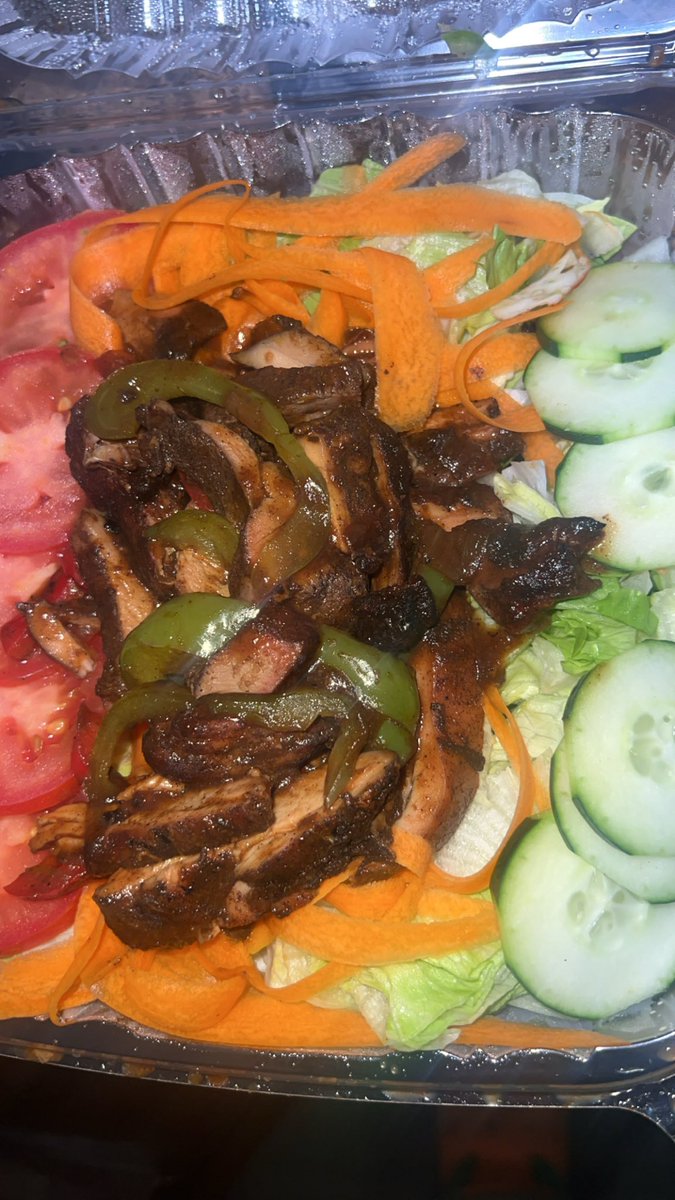 SidSpots's tweet photo. Brown Stew Chicken with a side of cabbage + a Jerk Chicken Salad @ Irie Jerk Bar &amp; Grill #Chicago #jerk #carryout #SidSpots https://t.co/erttwT8Y7o