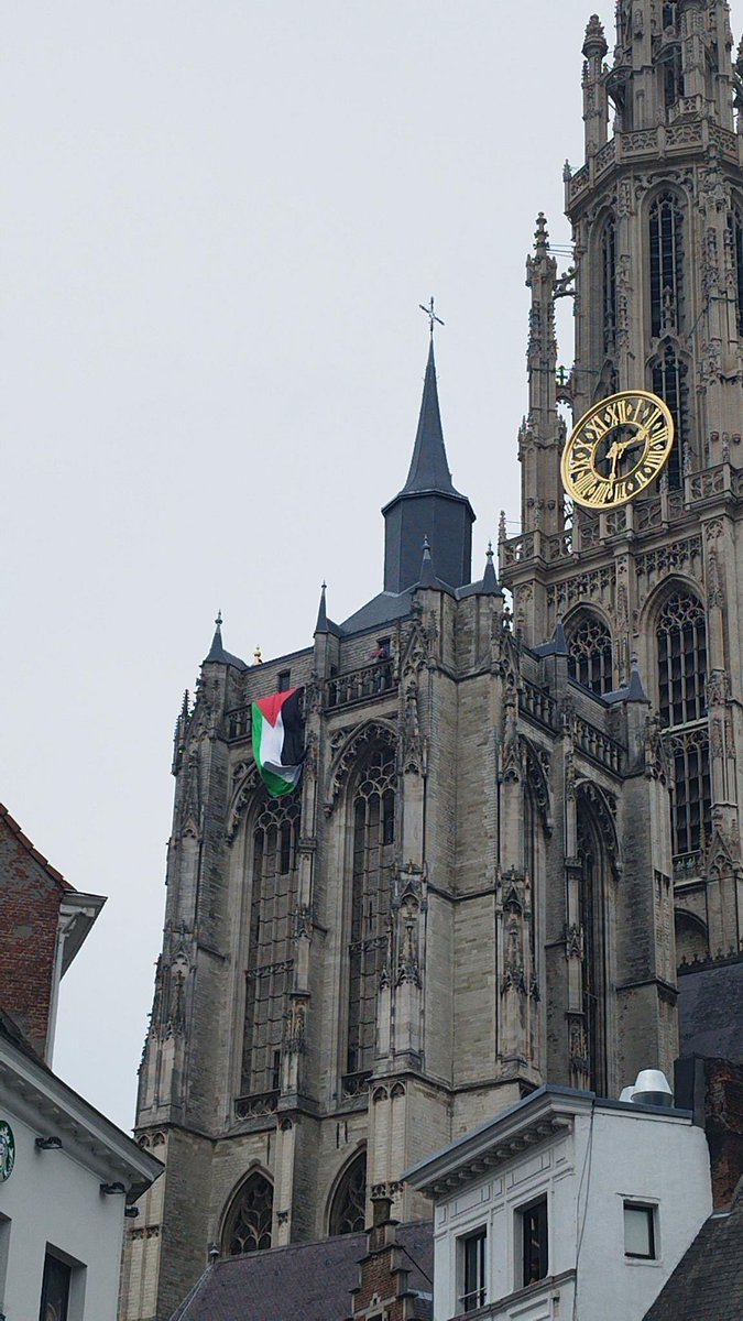 mohawadma's tweet photo. A massive Palestinian flag was draped over Antwerp Cathedral during a protest against the city-funded Shalom Festival.

Activists denounced public funding for an event they say is linked to groups supporting illegal settlements. #antwerp https://t.co/59zXXlnOGR