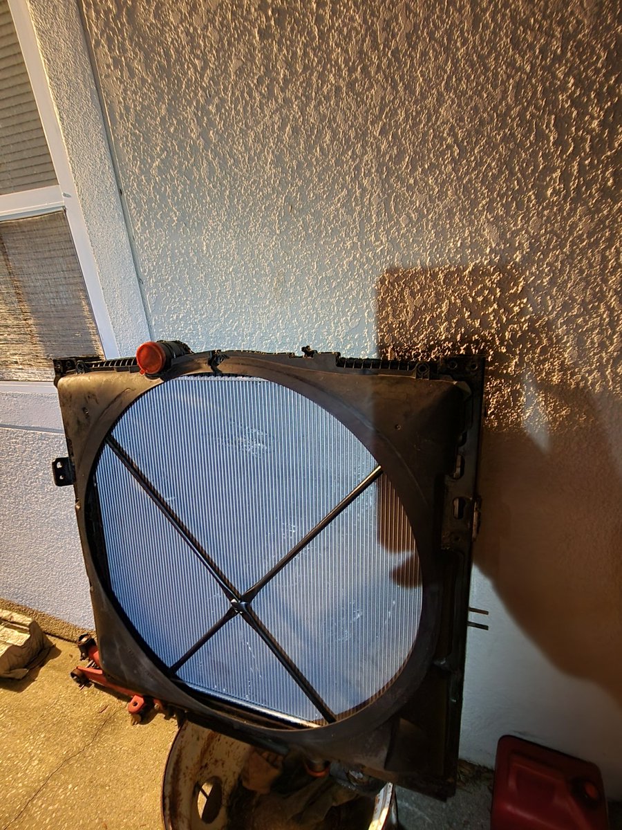 GRoux504's tweet photo. Radiators are simple , but this one went inside that metal casing, and without taking off that xBar. It  almost impossible 2 line those two bolts up on a right to go through 2the other side without that xbar coming off and damaging the new Radiator. But we did it. https://t.co/t3kxcMpNKD