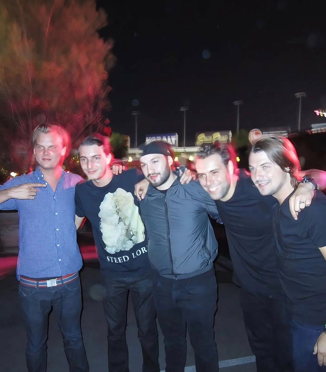 weraveyou's tweet photo. The new generation will never understand how iconic this photo is

Backstage at Electric Daisy Carnival (EDC) in 2011, this rare photo captured Avicii, Alesso, Axwell, Sebastian Ingrosso, and Steve Angello together just after Avicii’s set. https://t.co/Cc8E7ZzkLB
