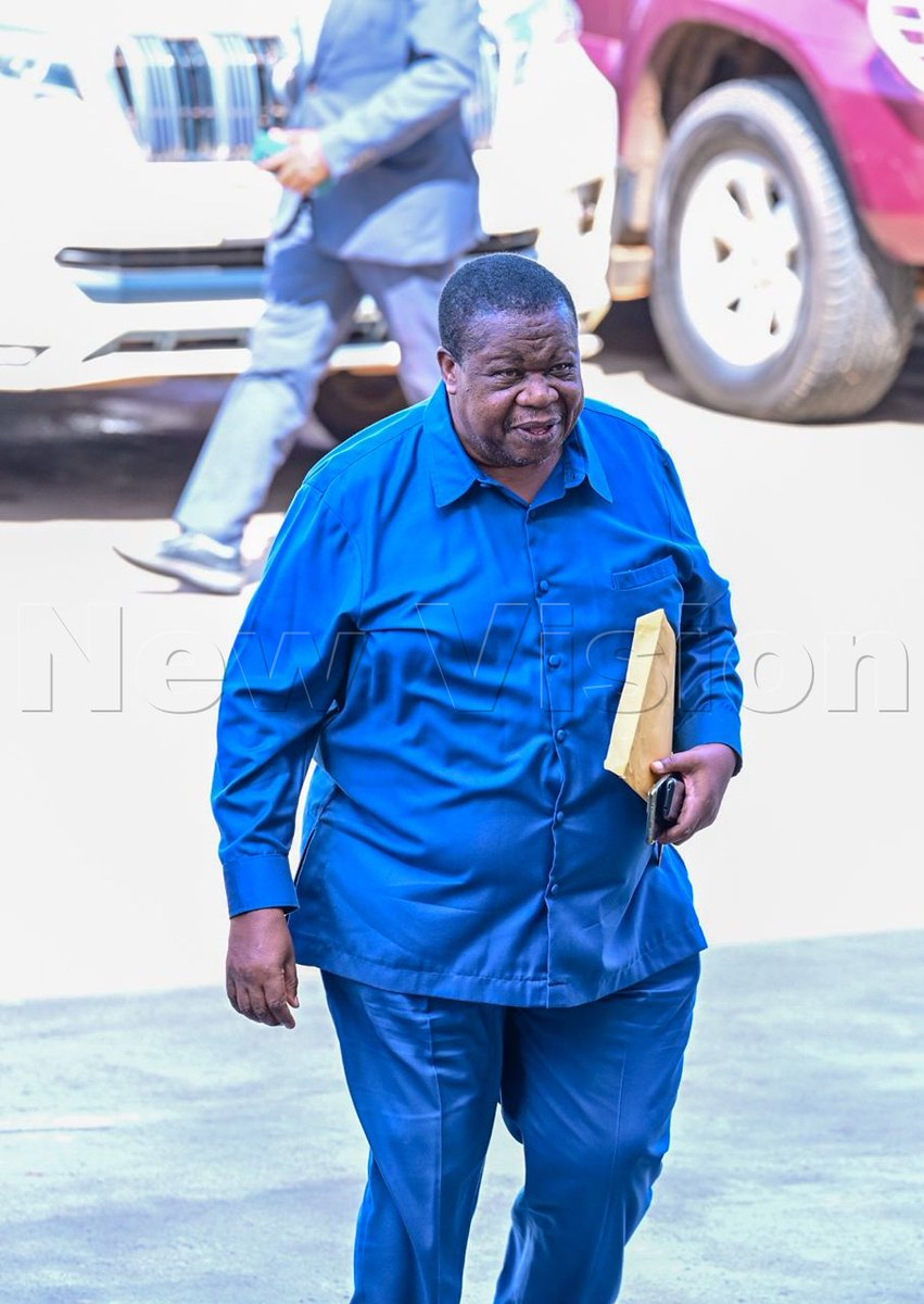 newvisionwire's tweet photo. 𝐌𝐈𝐍𝐈𝐒𝐓𝐄𝐑𝐒’ 𝐕𝐄𝐓𝐓𝐈𝐍𝐆 | 𝐏𝐀𝐑𝐋𝐈𝐀𝐌𝐄𝐍𝐓
Maj. Gen. (Rtd) @otafiire_k, Minister-designate of Water and Environment, arrives at Parliament for vetting… smiling, relaxed, and full of seasoned confidence. Gen. Otafiire is also MP for Ruhinda County, Mitooma District.

📸 | Courtesy of @kamiriam | @parliament
#VisionUpdates