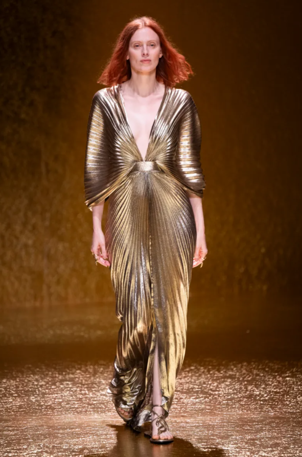 thabisomohapii's tweet photo. Marlo Hampton wearing a Roberto Cavalli ss2026 gold lame maxi dress https://t.co/G0TGLdjhNh