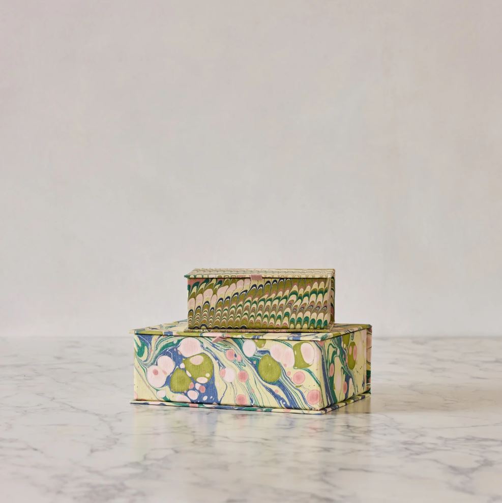 SimplyBuckhead's tweet photo. LITTLE LUXURIES

Romanticizing your life is easy when you are surrounded by beautiful things.

Small luxuries like porcelain keepsake boxes, sophisticated tissue box covers and handmade pottery are little reminders that beauty is everywhere, if you know where to look. When perched on a shelf or front and center on a coffee table, these tiny items have the ability to bring a smile to your face.

Marbled Keepsake Boxes ($232 for set)

Double down on design with a pair of block-print keepsake boxes from Nashville-based Reed Smythe. Handcrafted in Jaipur, India, they are made using traditional marbling and bookbinding techniques. Place keepsakes like photographs or cards within, or use the paper boxes in a closet to protect precious jewelry. Keith Smythe Meacham co-founded the brand with the late Southern author, journalist and entertaining specialist Julia Reed.

Reed Smythe & Company
615.200.8287
https://t.co/ENtTWl8Ctj
@reedsmytheco

Read more in the June issue of @SimplyBuckhead out now!

📝 Lauren Finney Harden

#SimplyBuckhead #LittleLuxuries #ReedSmythe #HomeDecor #KeepsakeBoxes