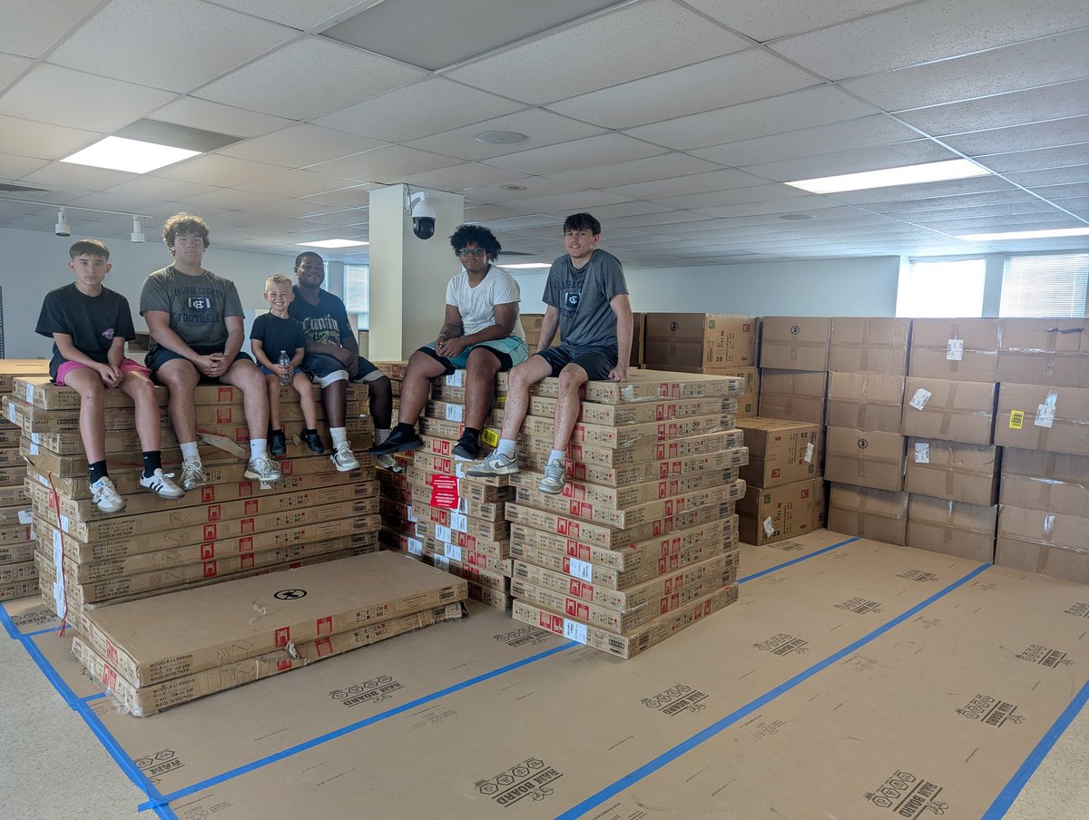 CountyHalifax's tweet photo. HCHS football players, coaches and family helped move 20 pallets of office furniture today....need something moved call linemen. https://t.co/8GIJ0ikPPp