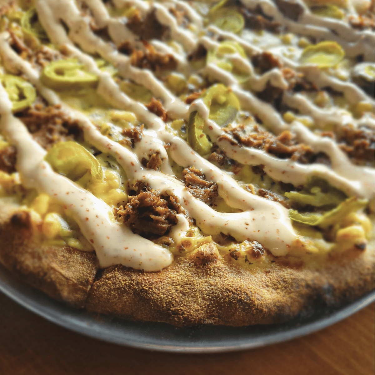 strongspizza's tweet photo. Back and bringing the flavor 🌽🔥 The Muchacho (16) at Strong's Pizza layers a street corn base with tender barbacoa, jalapenos, and house made Tajin Crema for a bold Mexican inspired bite you'll want again. #StrongsPizza #TheMuchacho #PizzaLovers https://t.co/nUOJqcSKc2